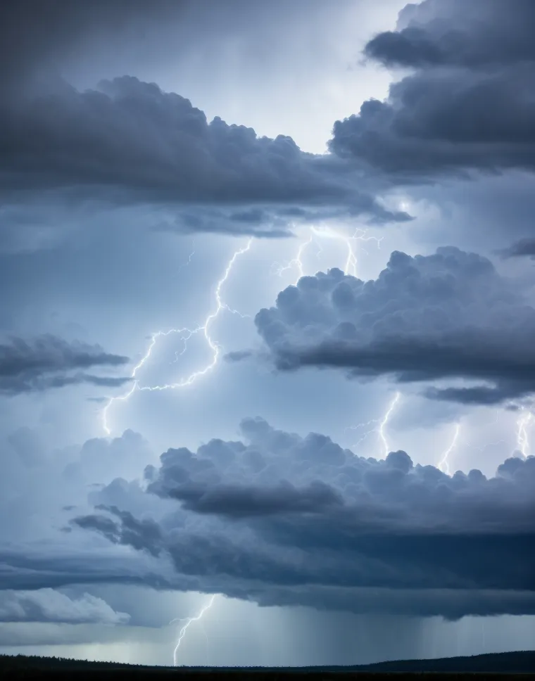 There is a dark stormy sky with several bolts of lightning. The sky is filled with dark clouds. The lightning is bright and white. The storm is likely to cause heavy rain and strong winds.